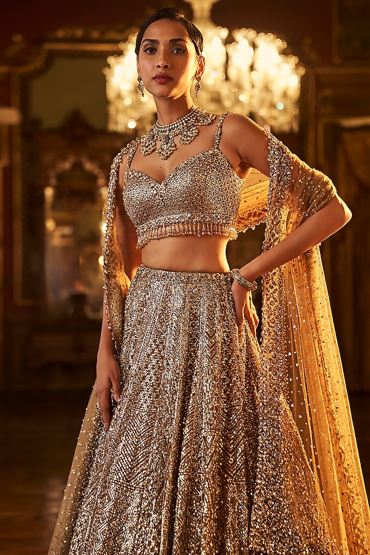 Antique Gold Net Sequins Embroidered Bridal Lehenga Set by Seema Gujral at Pernia's Pop Up Shop
