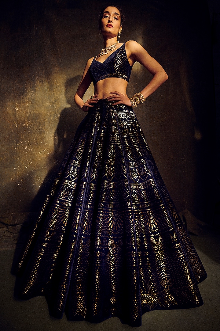 MUDRA's lehenga collections blend tradition and contemporary allure,  adorned with fine details that speak volumes of elegance. #lehengaa