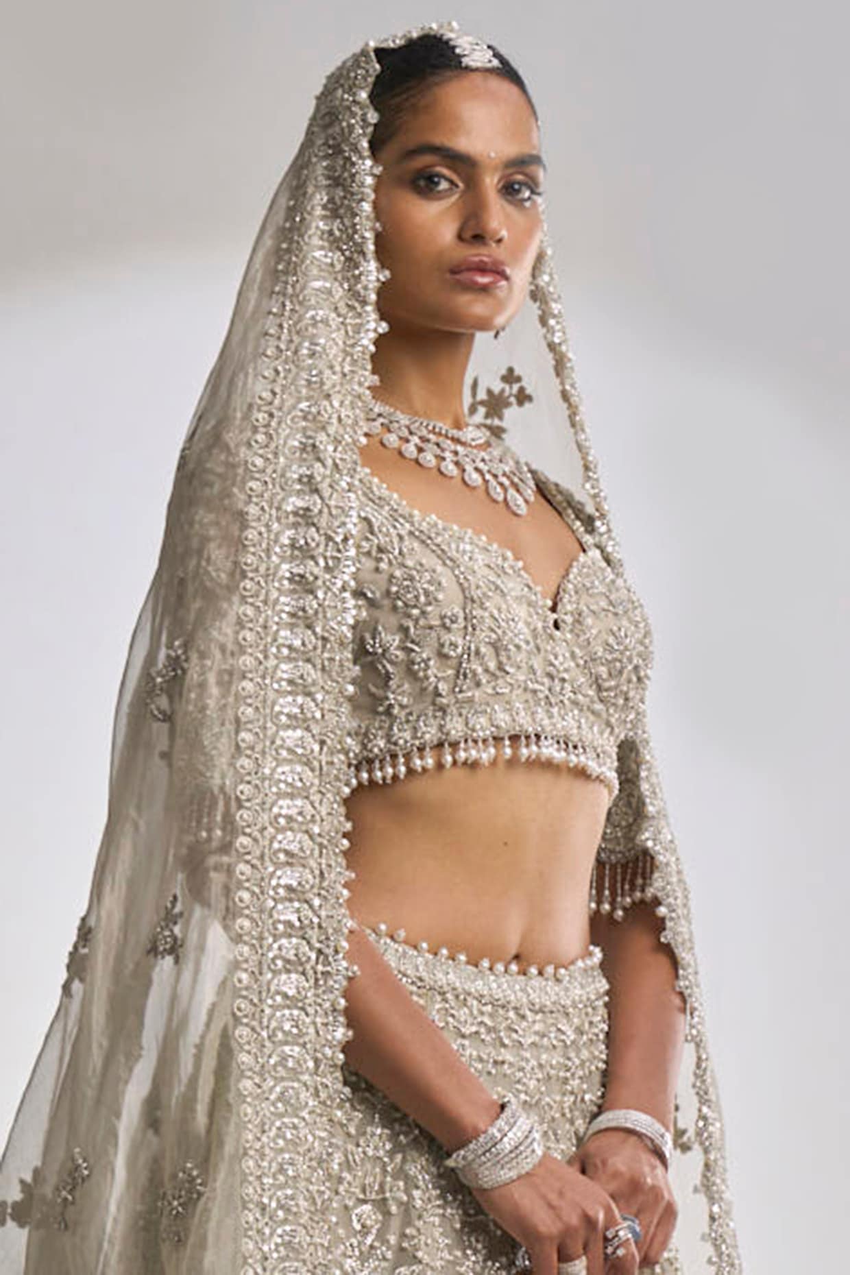 Buy Grey Raw Silk Hand Embroidery Crystal Lotus Bridal Lehenga Set For  Women by Disha Patil Online at Aza Fashions.