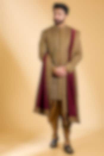 Antique Gold Raw Silk Embroidered Sherwani Set by Seema Gujral Men