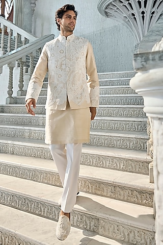 Nude Raw Silk Cutwork Embroidered Bundi Jacket Set by Seema Gujral Men