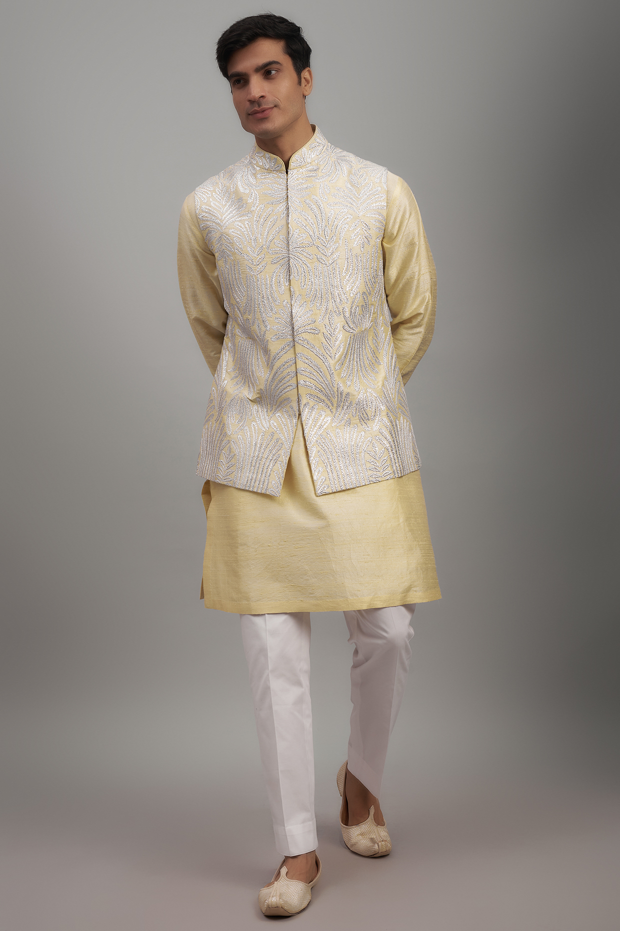 Yellow Raw Silk Embroidered Nehru Jacket Set by Seema Gujral Men at Pernia's Pop Up Shop