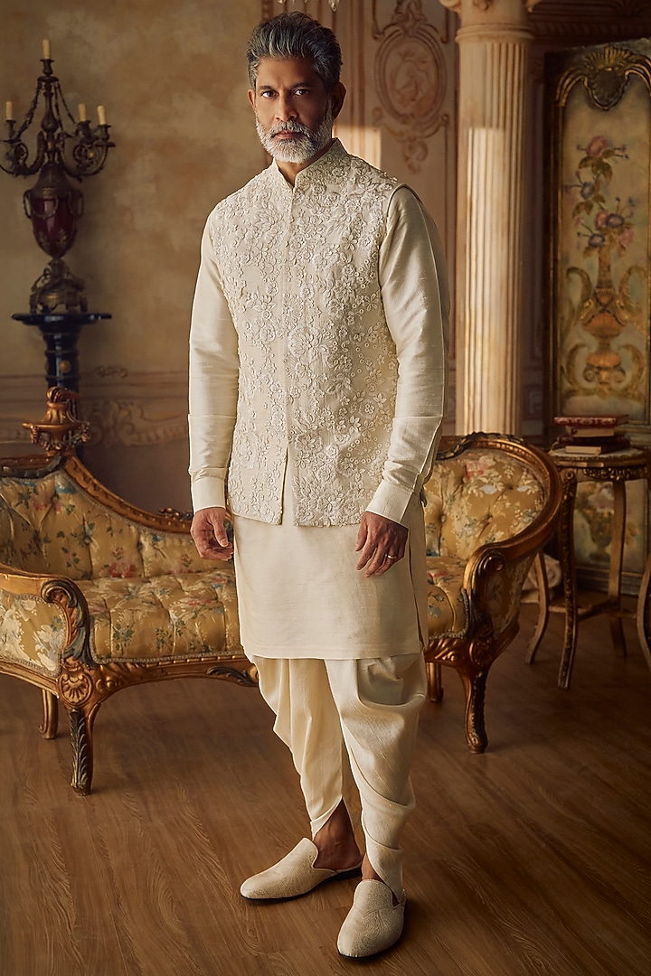 Champagne Raw Silk Floral Embroidered Bundi Jacket Set by Seema Gujral Men