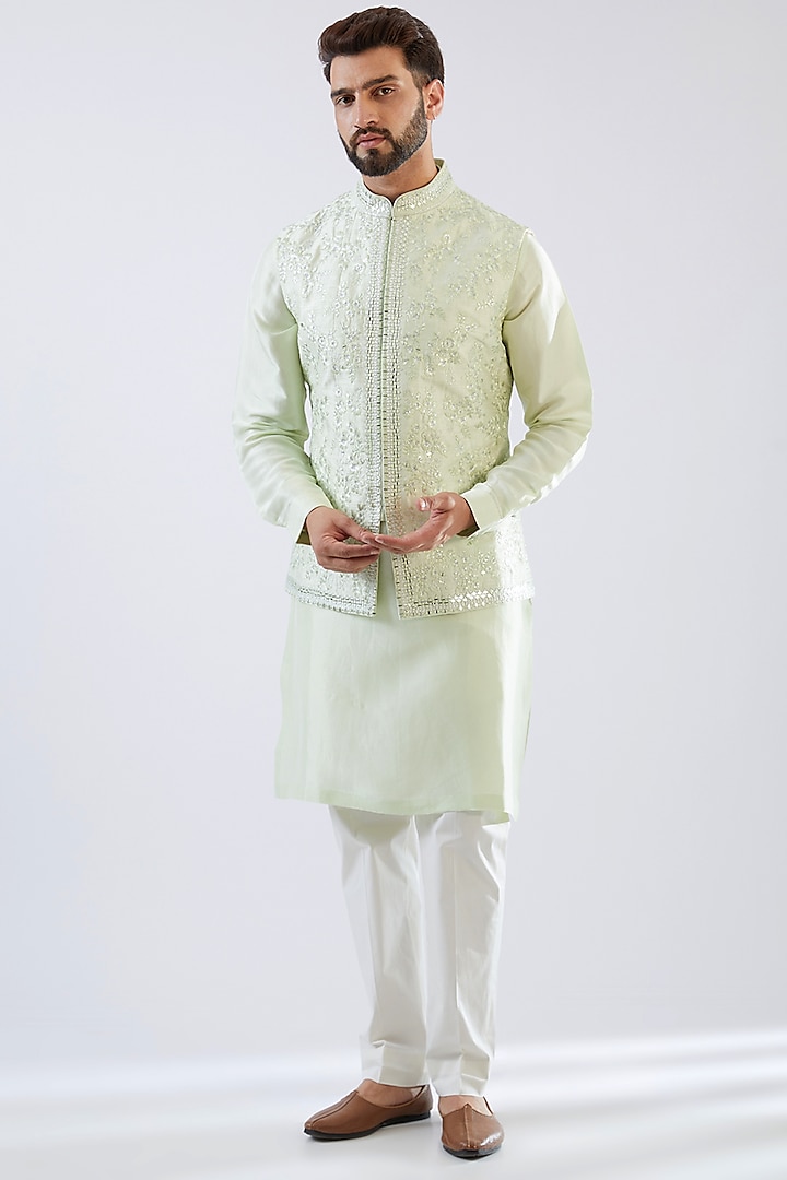 Pastel Green Raw Silk Sequins Embroidered Bundi Jacket Set by Seema Gujral Men