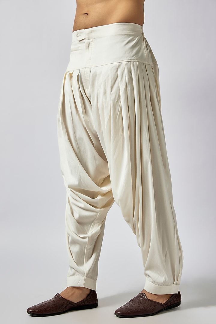 Cream Silk Blend Draped Salwar Pants by Seema Gujral Men at Pernia's Pop Up Shop