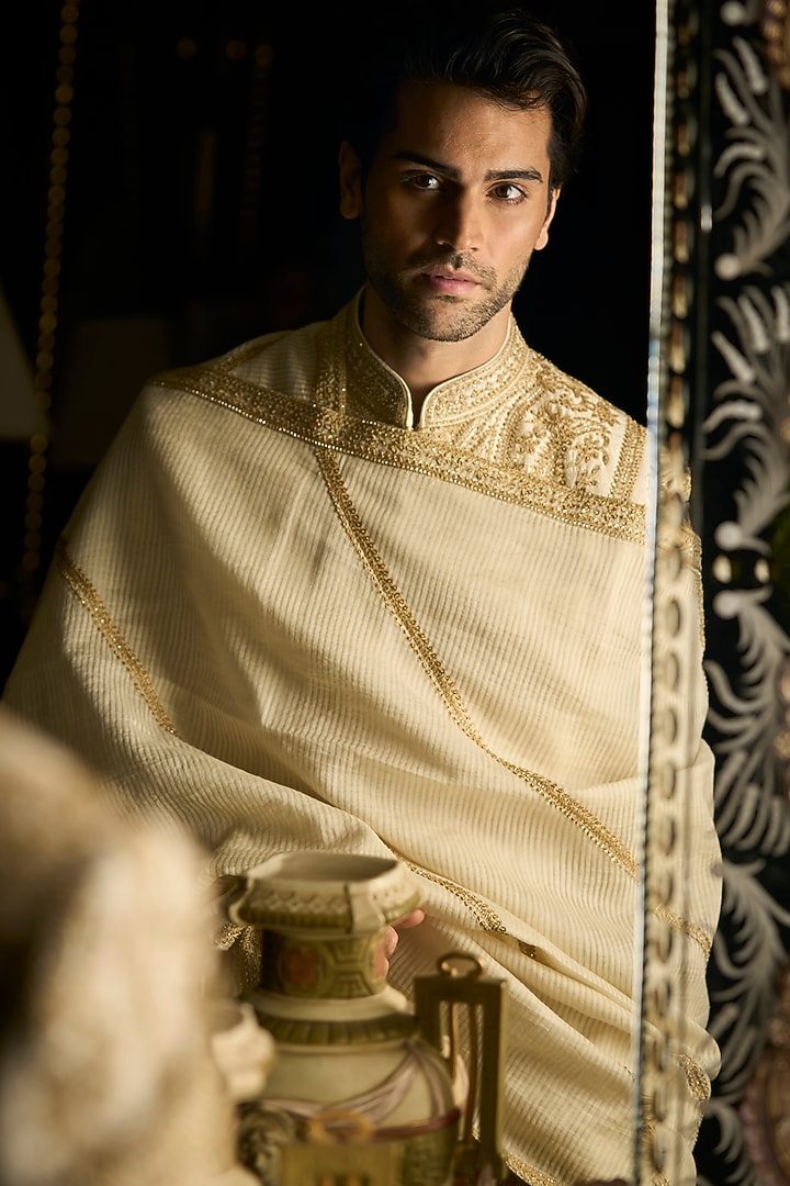 Cream Raw Silk Embroidered Groom Sherwani Set With Juttis & Stole by Seema Gujral Men at Pernia's Pop Up Shop