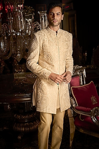 Cream Raw Silk Embroidered Bandhgala Set With Juttis by Seema Gujral Men