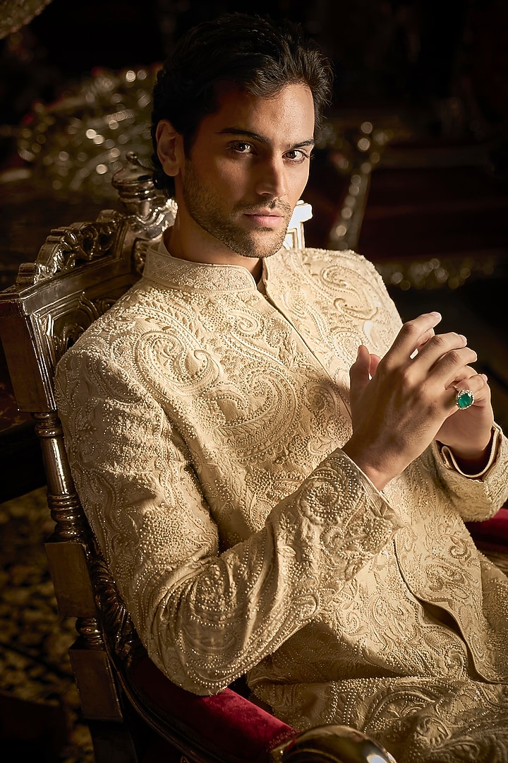 Cream Raw Silk Embroidered Bandhgala Set With Juttis by Seema Gujral Men at Pernia's Pop Up Shop