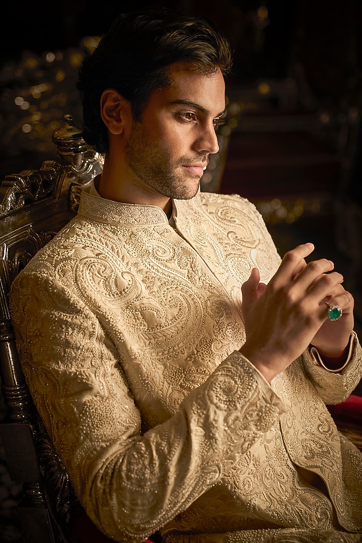 Cream Raw Silk Embroidered Bandhgala Set With Juttis by Seema Gujral Men at Pernia's Pop Up Shop