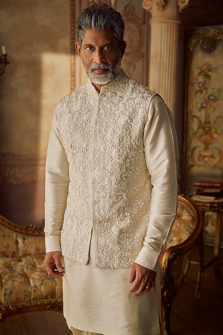 Champagne Raw Silk Floral Embroidered Bundi Jacket Set by Seema Gujral Men at Pernia's Pop Up Shop