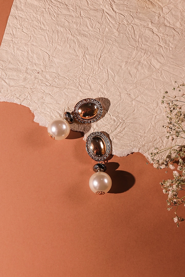 Gold Finish Shell Pearl Dangler Earrings by Senshi