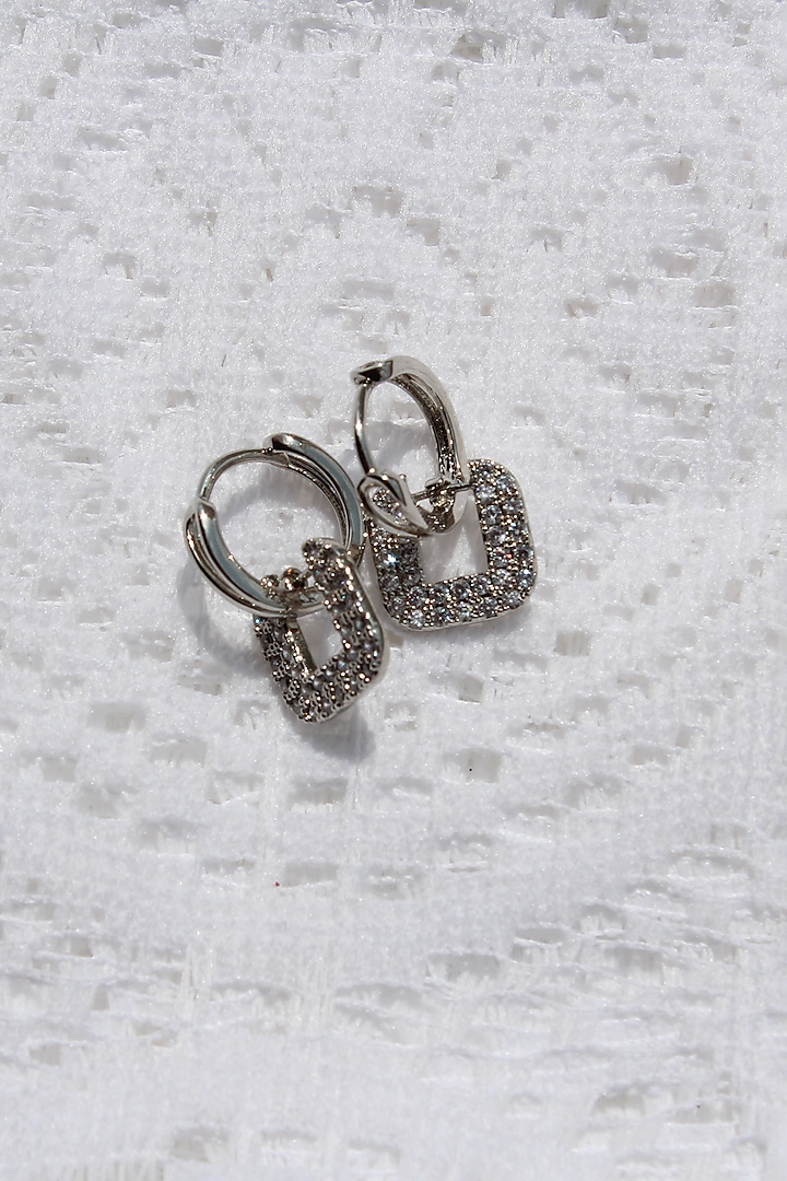 White Finish Zircon Dangler Earrings by Senshi
