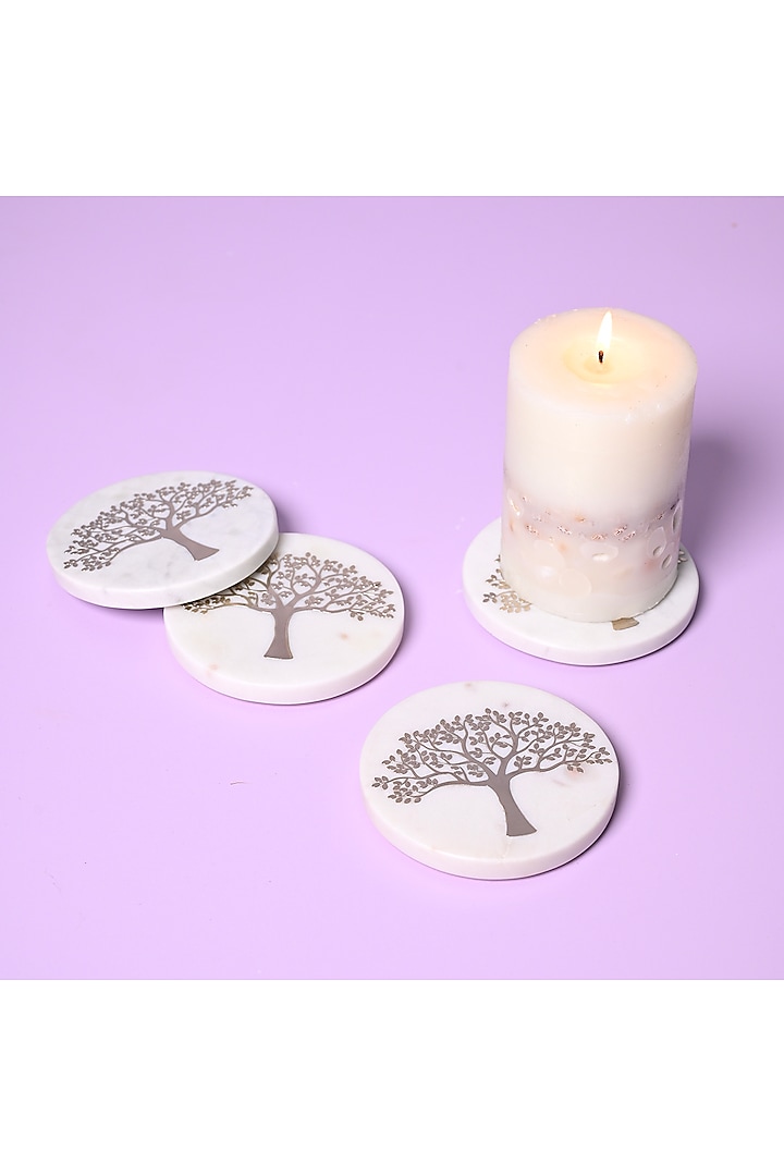 White Marble and Metal Tree of Life Round Coasters (Set Of 4 ) by Serein Wellness at Pernia's Pop Up Shop