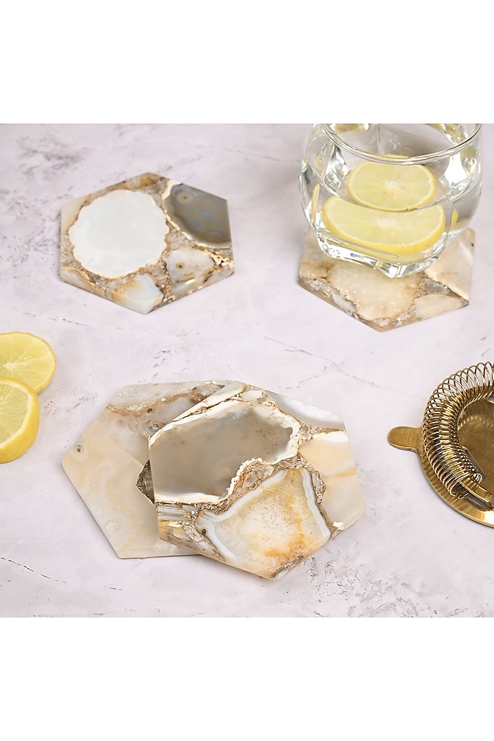 Brown Hexagonal Agate Coaster (Set Of 4) by Serein Wellness at Pernia's Pop Up Shop