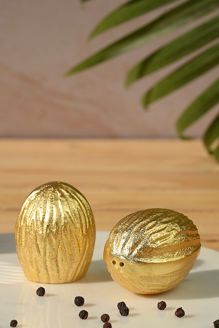 Gold Aluminium Walnut Salt and Pepper Shakers by Serein Wellness at Pernia's Pop Up Shop