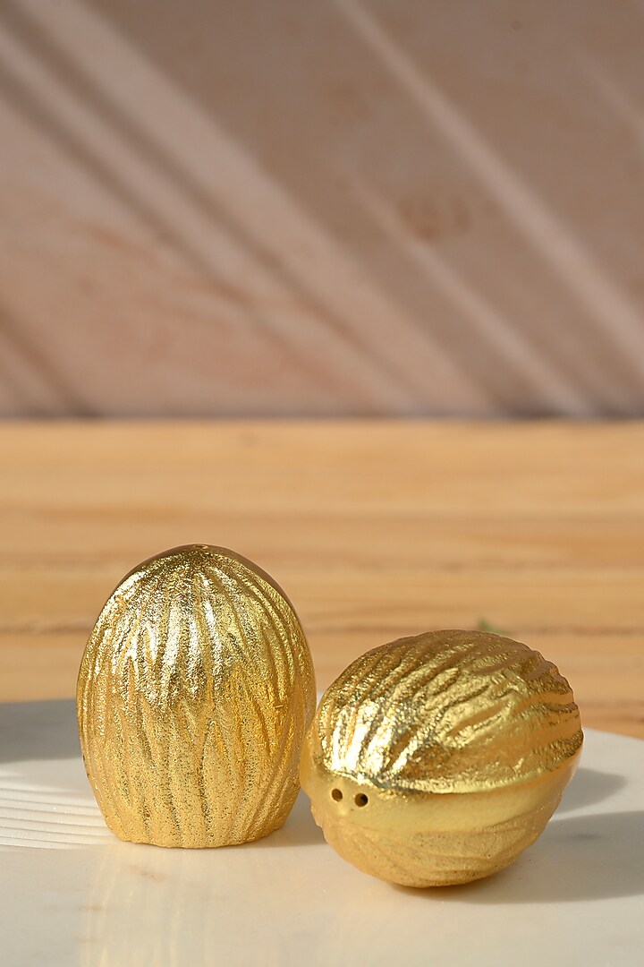 Gold Aluminium Walnut Salt and Pepper Shakers by Serein Wellness at Pernia's Pop Up Shop