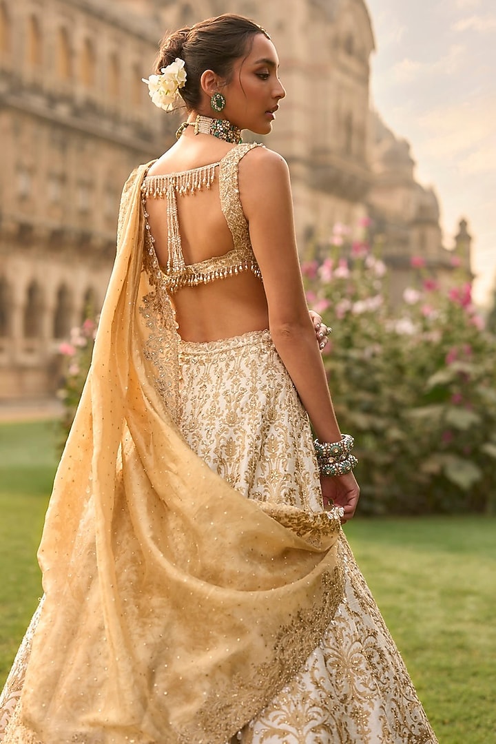 Ivory Raw Silk Threadwork Bridal Lehenga Set by Seema Gujral at Pernia's Pop Up Shop