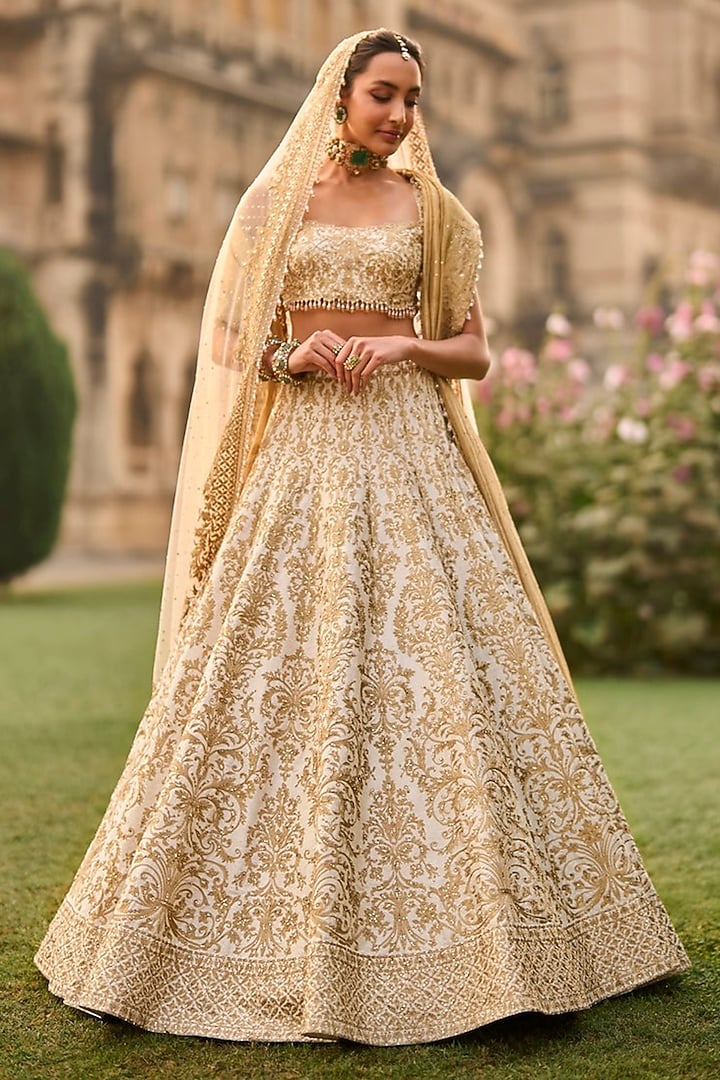 Ivory Raw Silk Threadwork Bridal Lehenga Set by Seema Gujral at Pernia's Pop Up Shop
