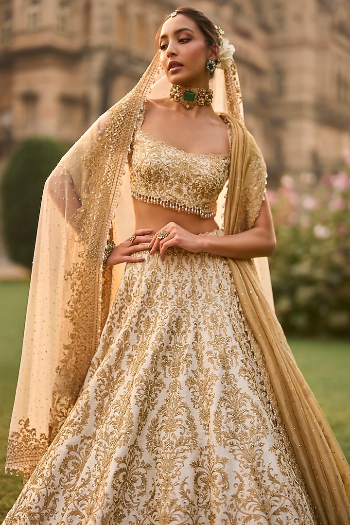 Ivory Raw Silk Threadwork Bridal Lehenga Set by Seema Gujral at Pernia's Pop Up Shop