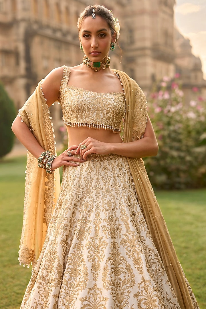 Ivory Raw Silk Threadwork Bridal Lehenga Set by Seema Gujral at Pernia's Pop Up Shop