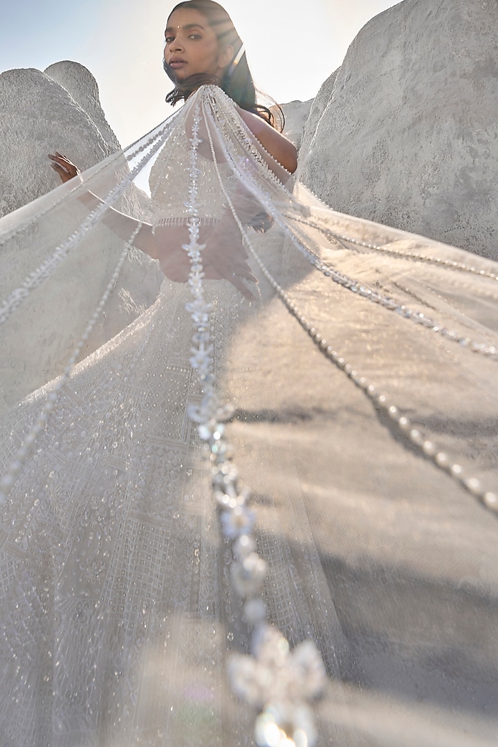 Ivory Net Sequins & Pearl Embroidered Bridal Lehenga Set by Seema Gujral at Pernia's Pop Up Shop