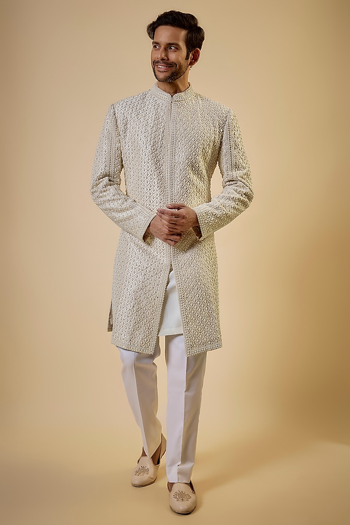 Ivory Raw Silk Pearl Embroidered Sherwani Set by Seema Gujral Men