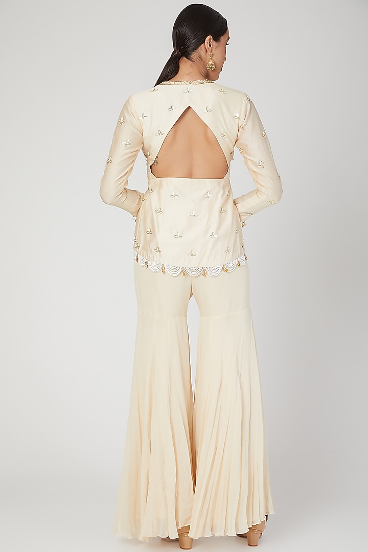 Ivory Embroidered Top With Pants by Sanya Gulati at Pernia's Pop Up Shop