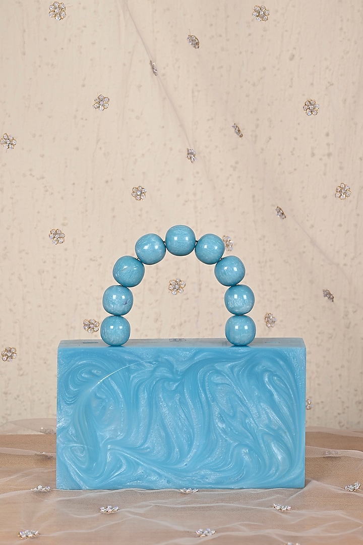 Carolina Blue Resin Clutch by Soniya G Accessories