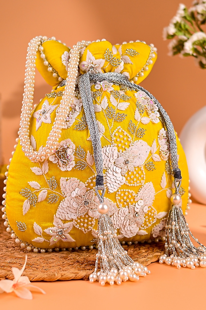 Yellow Raw Silk Embroidered Potli by Sugarcrush at Pernia's Pop Up Shop