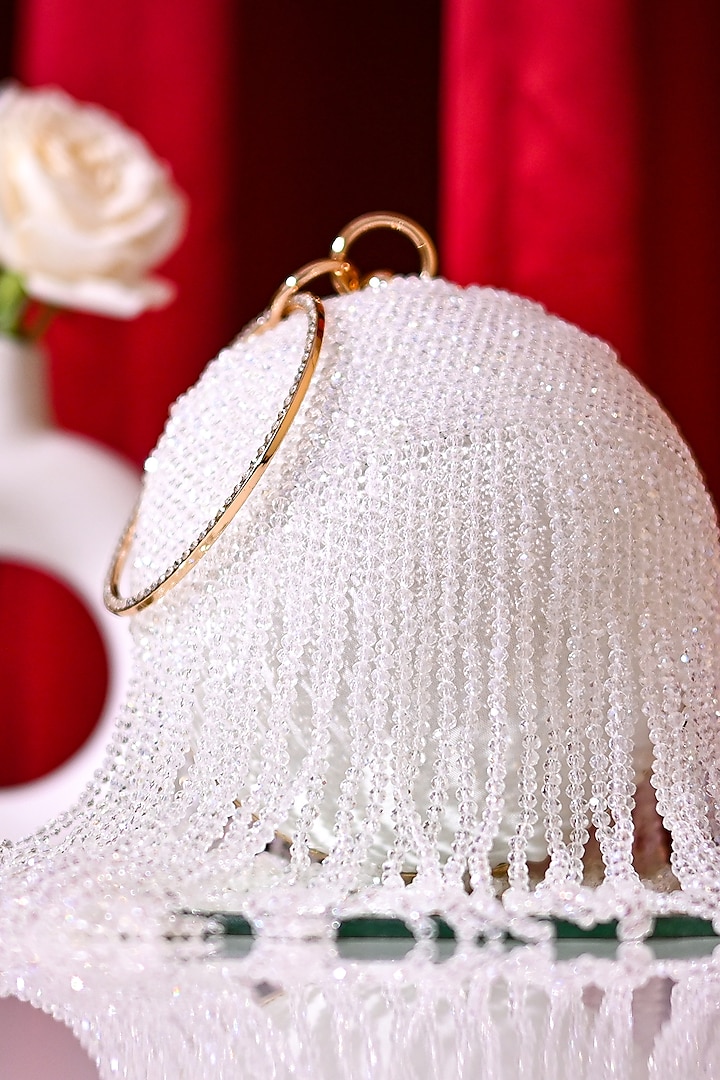 White Raw Silk Crystal Embroidered Round Clutch by Sugarcrush