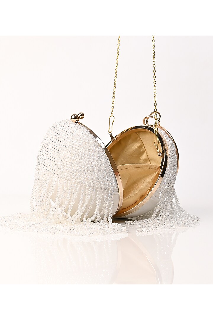 White Raw Silk Crystal Embroidered Round Clutch by Sugarcrush at Pernia's Pop Up Shop
