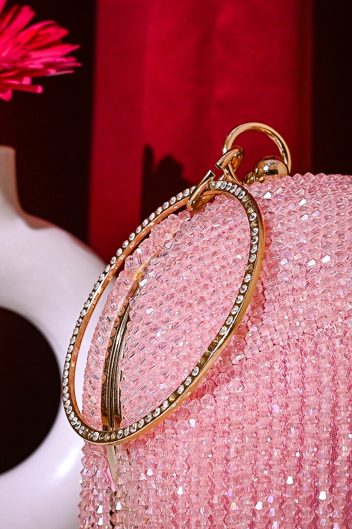 Pink Raw Silk Crystal Embroidered Round Clutch by Sugarcrush at Pernia's Pop Up Shop
