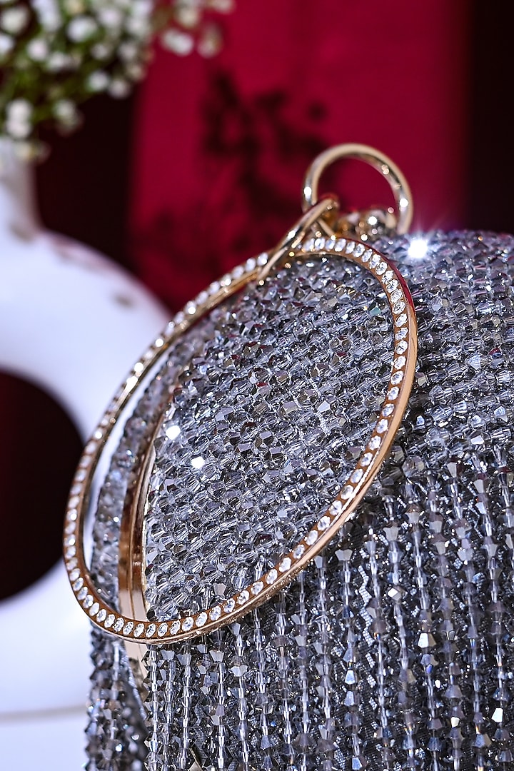 Grey Raw Silk Crystal Embroidered Round Clutch by Sugarcrush at Pernia's Pop Up Shop