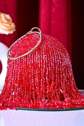 Red Raw Silk Crystal Embroidered Round Clutch by Sugarcrush