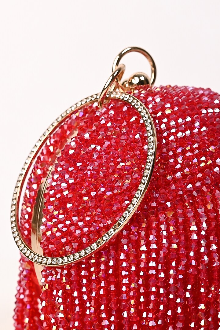Red Raw Silk Crystal Embroidered Round Clutch by Sugarcrush at Pernia's Pop Up Shop