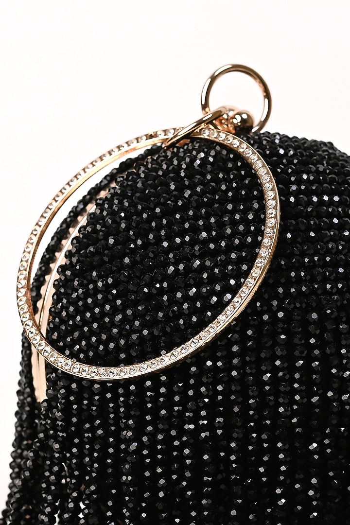 Black Raw Silk Crystal Embroidered Round Clutch by Sugarcrush at Pernia's Pop Up Shop