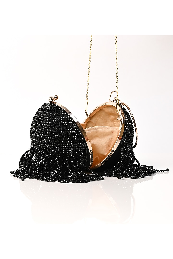 Black Raw Silk Crystal Embroidered Round Clutch by Sugarcrush at Pernia's Pop Up Shop