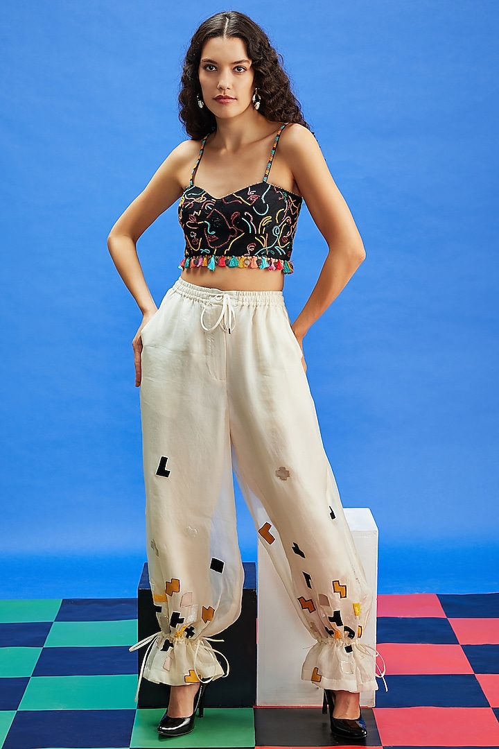 Ivory Organza & Dupion Sequins Embroidered Trousers by Shilpi Gupta Surkhab
