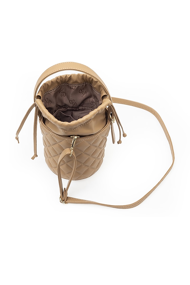Beige Leather Bucket Bag by SG BY SONIA GULRAJANI at Pernia's Pop Up Shop