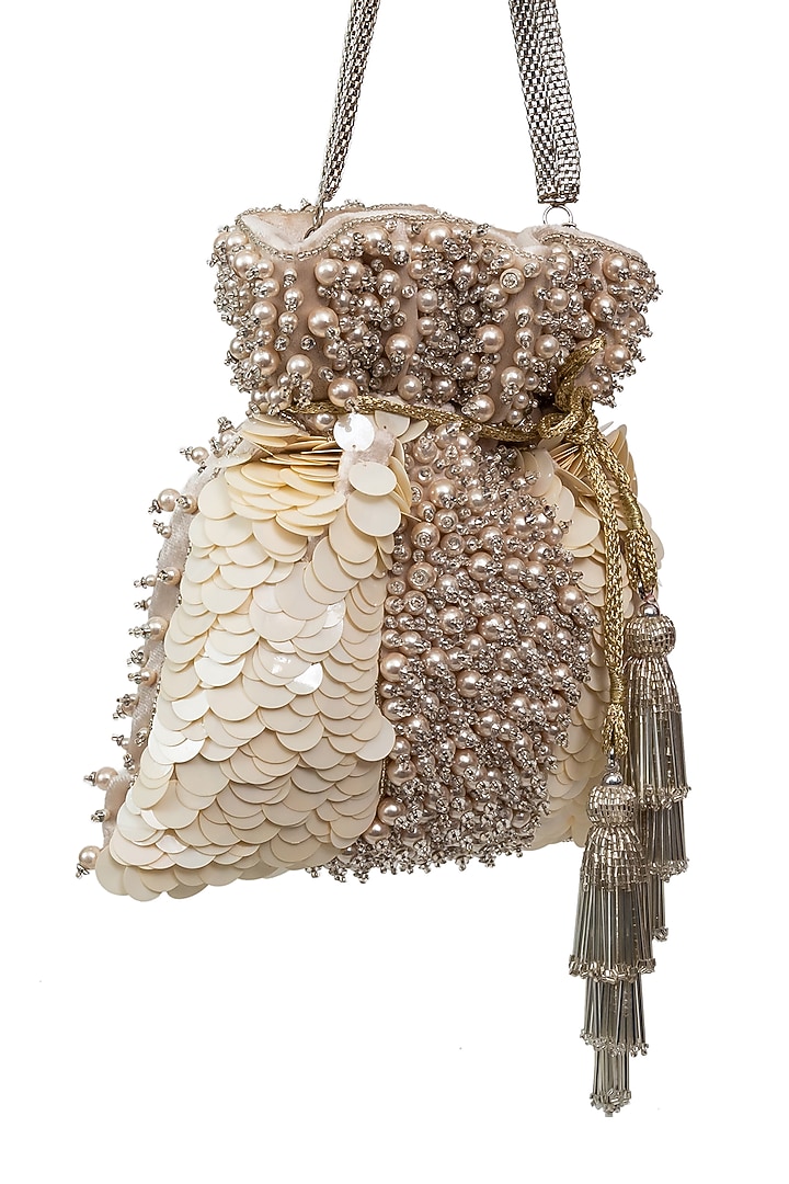 Cream Sequins Embroidered Potli by SG BY SONIA GULRAJANI at Pernia's Pop Up Shop
