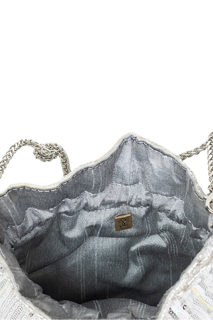 Silver Raw Silk Sequins Embroidered Potli by SG BY SONIA GULRAJANI at Pernia's Pop Up Shop