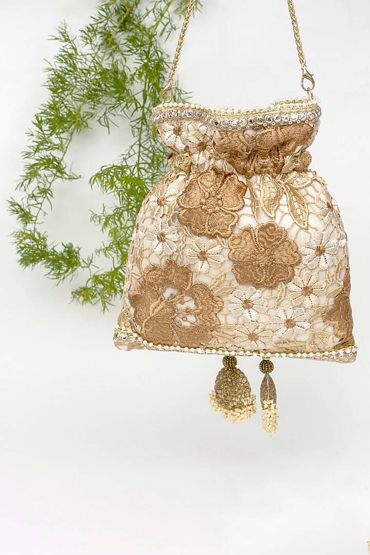 Beige Raw Silk Thread Embroidered Potli by SG BY SONIA GULRAJANI at Pernia's Pop Up Shop