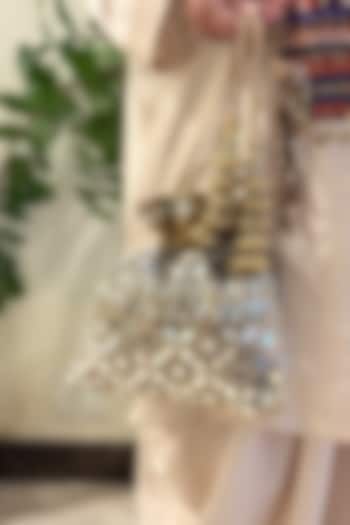 Gold Raw Silk Mirror Work Potli by SG BY SONIA GULRAJANI at Pernia's Pop Up Shop