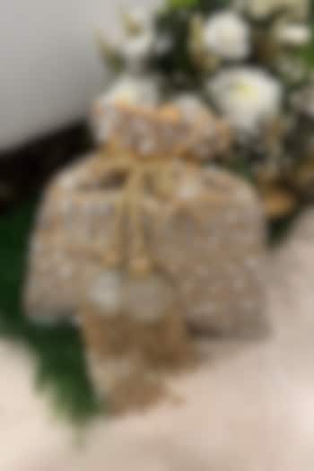 Beige Raw Silk Zari Embellished Potli by SG BY SONIA GULRAJANI at Pernia's Pop Up Shop