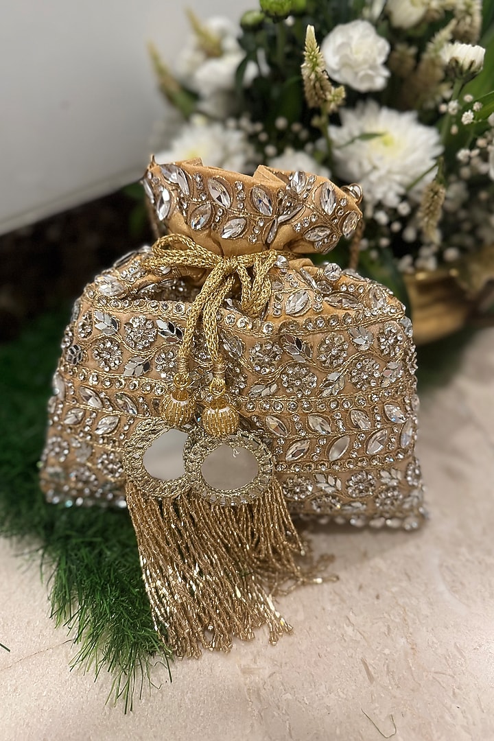 Beige Raw Silk Zari Embellished Potli by SG BY SONIA GULRAJANI at Pernia's Pop Up Shop