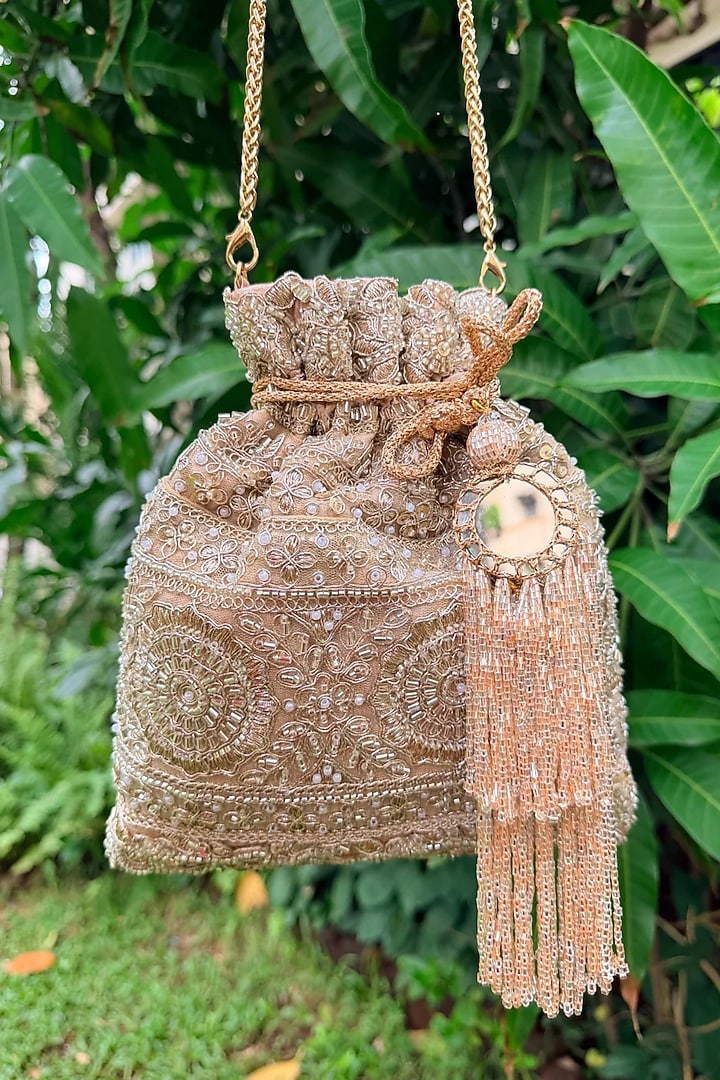 Rose Gold Raw Silk Mirror Embellished Potli Bag by SG BY SONIA GULRAJANI at Pernia's Pop Up Shop