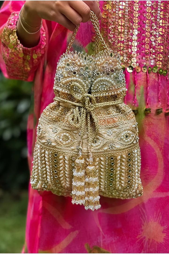 Gold Raw Silk Pearl Embellished Potli Bag by SG BY SONIA GULRAJANI at Pernia's Pop Up Shop