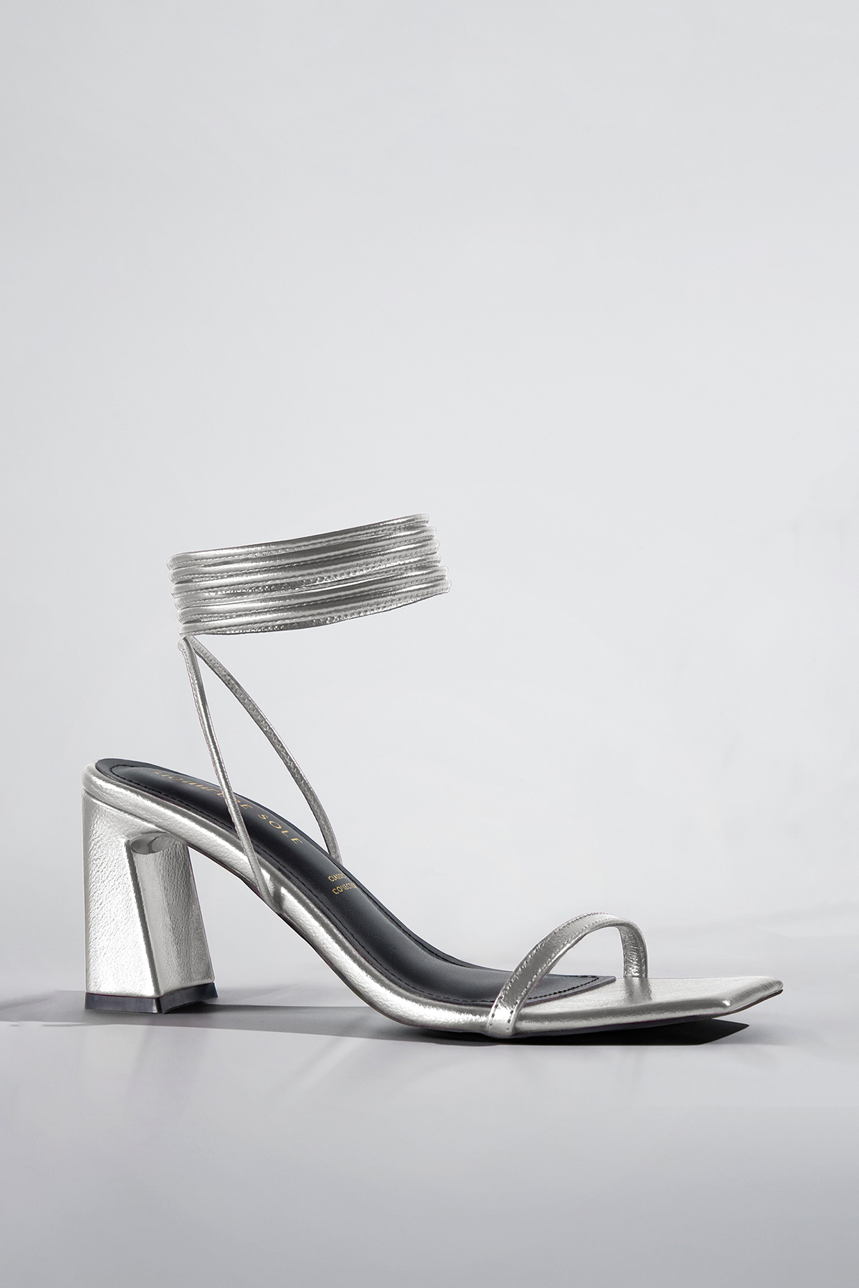 Metallic Silver Vegan Leather Block Heels by Signature Sole at Pernia's Pop Up Shop