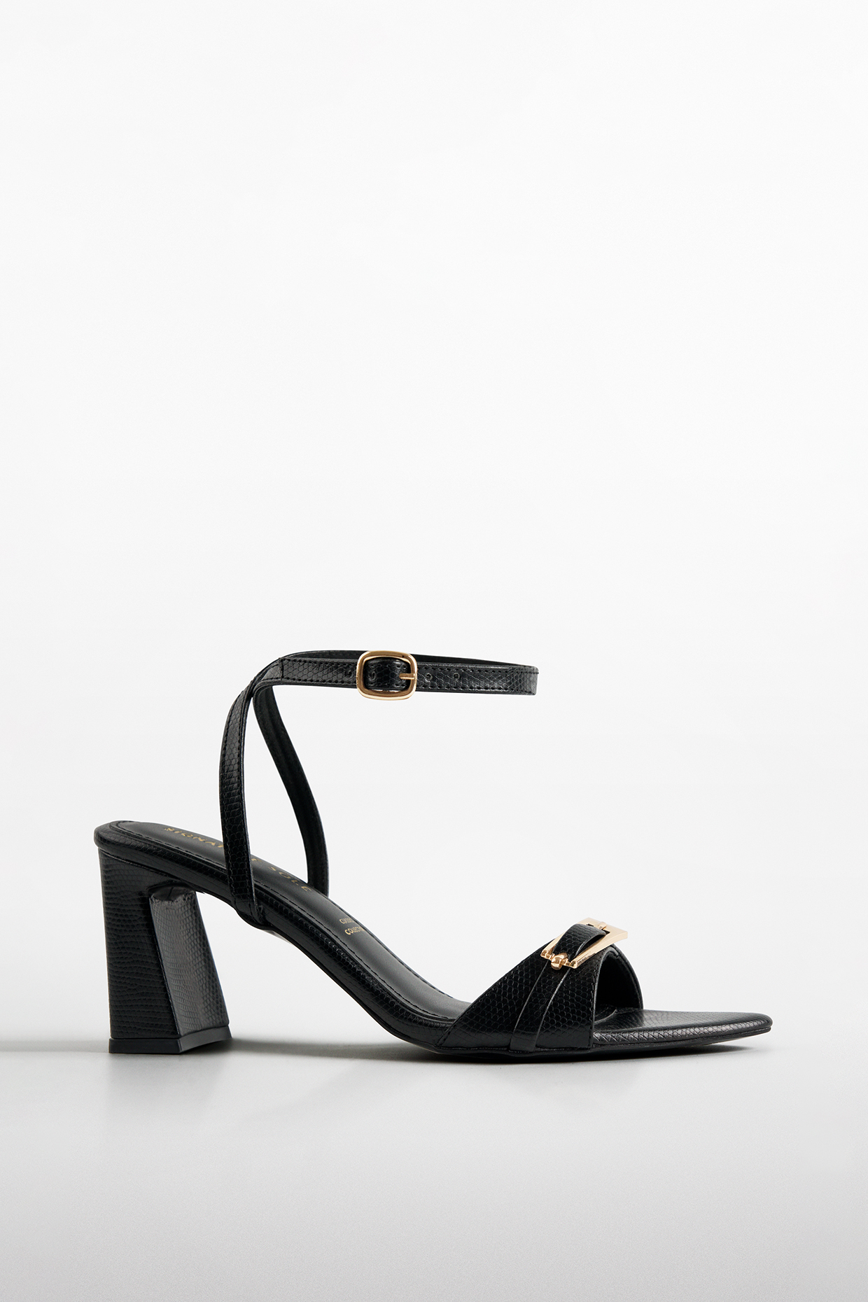 Black Vegan Leather Textured Block Heels by Signature Sole at Pernia's Pop Up Shop