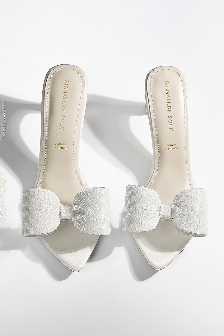 White Vegan Leather Crystal Bow Heels by Signature Sole at Pernia's Pop Up Shop